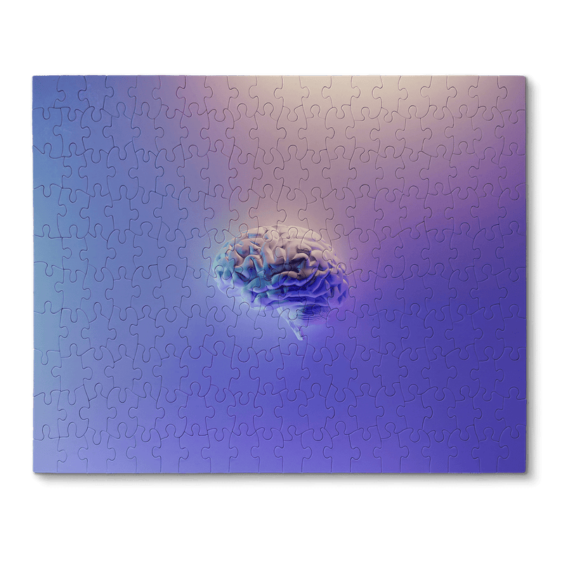 A stylized brain on a purple gradient jigsaw puzzle