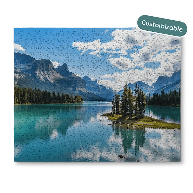 Jigsaw puzzle with a scenic view of mountains and a lake, featuring customizable text.