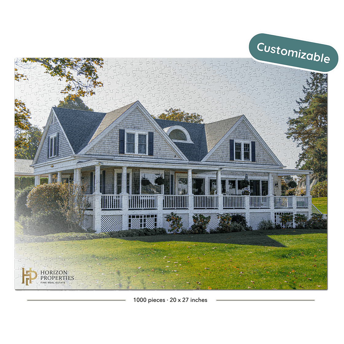 A custom jigsaw puzzle featuring a classic white and gray Victorian-style house on a green lawn, with a black border, 'Customizable' badge, and Horizon Properties branding.